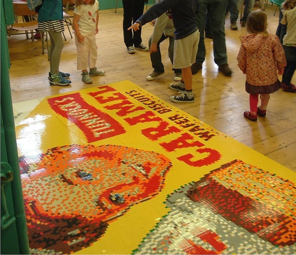 Tunnock's Caramel Lego mosaic on the floor.
